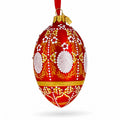 Ornate Floral Medallion on Matte Red Glass Egg Ornament