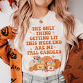 Cozy Autumn Graphic Tee – \"The Only Thing Getting Lit This Weekend Are My Fall Candles\"